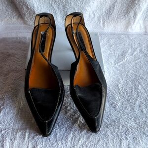 Black Slingback Shoes by Unisa.